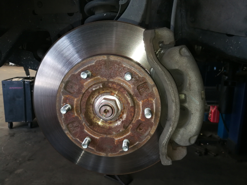 Understanding brake noises in Lake Geneva, WI with GLP Automotive auto repair experts. Image of worn brakes on a car that came in for brake service.